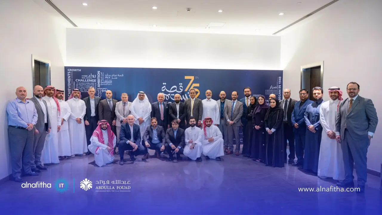 Alnafitha IT and Abdulla Fouad Group team celebrating successful partnership in Saudi Arabia